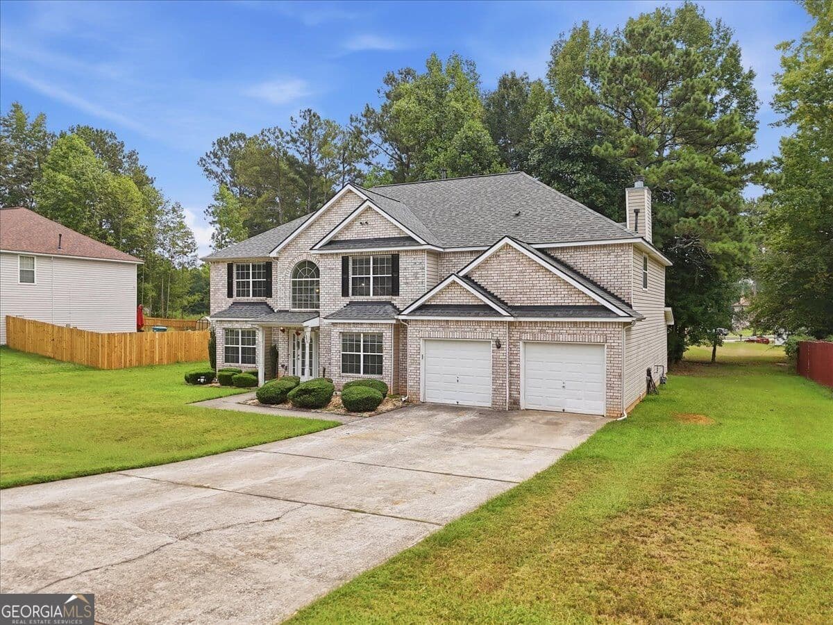 5 bedroom, 3 bathroom, 3,908 sq ft single family residence for sale at 145 Madisyn Drive, Hampton, GA 30228 — photo 3
