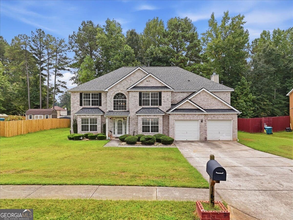 5 bedroom, 3 bathroom, 3,908 sq ft single family residence for sale at 145 Madisyn Drive, Hampton, GA 30228 — photo 4