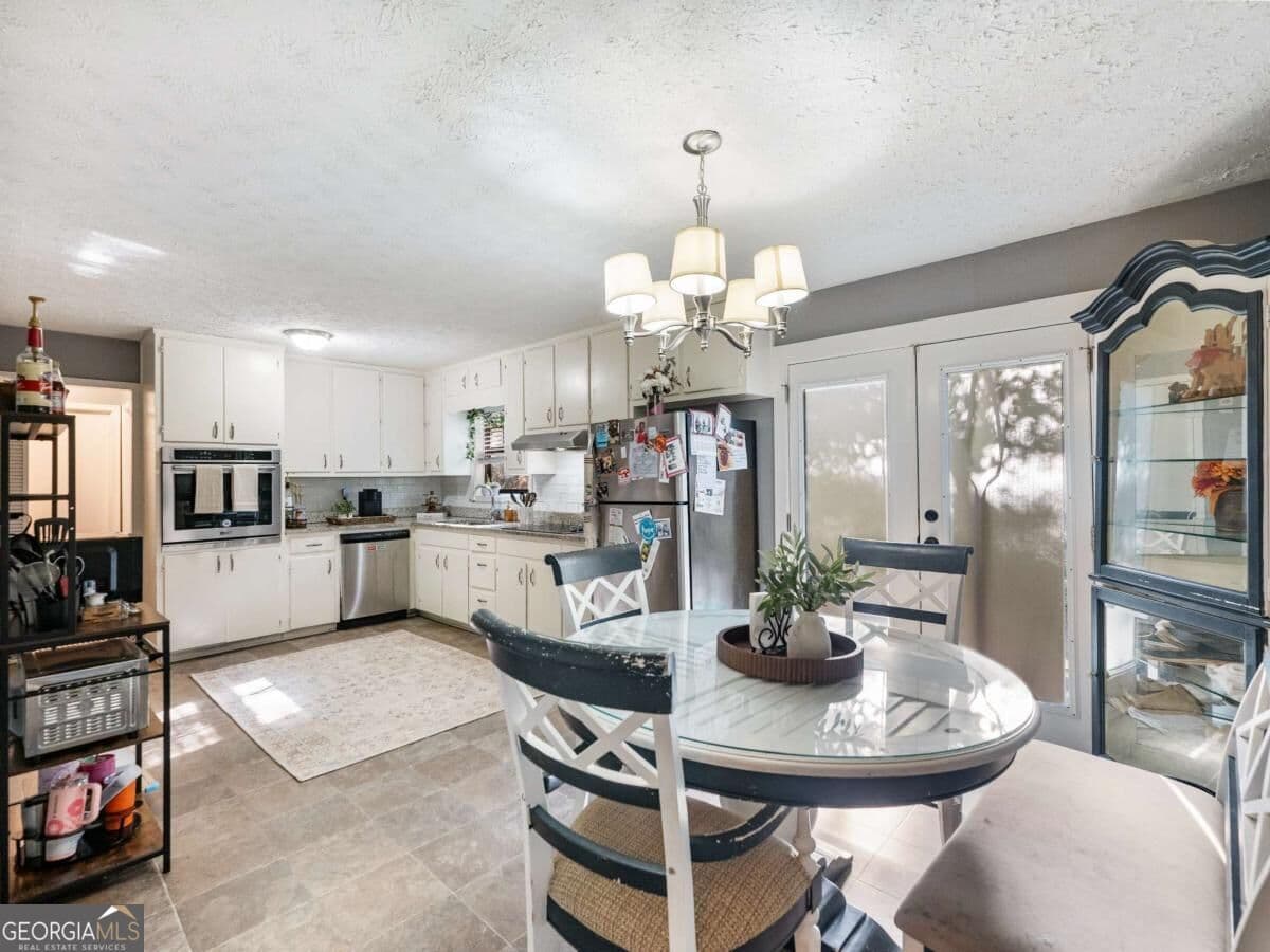 3 bedroom, 3 bathroom, 1,680 sq ft single family residence for sale at 6946 Cedar Drive, Riverdale, GA 30296 — photo 8