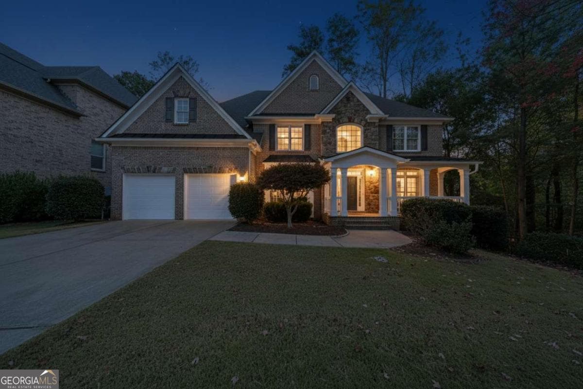 6 bedroom, 5 bathroom, 6,205 sq ft single family residence for sale at 3161 Willowstone Drive, Duluth, GA 30096 — photo 2