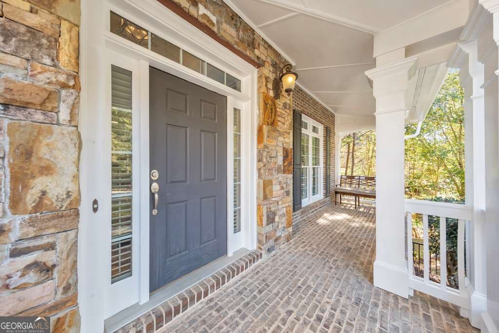 6 bedroom, 5 bathroom, 6,205 sq ft single family residence for sale at 3161 Willowstone Drive, Duluth, GA 30096 — photo 4