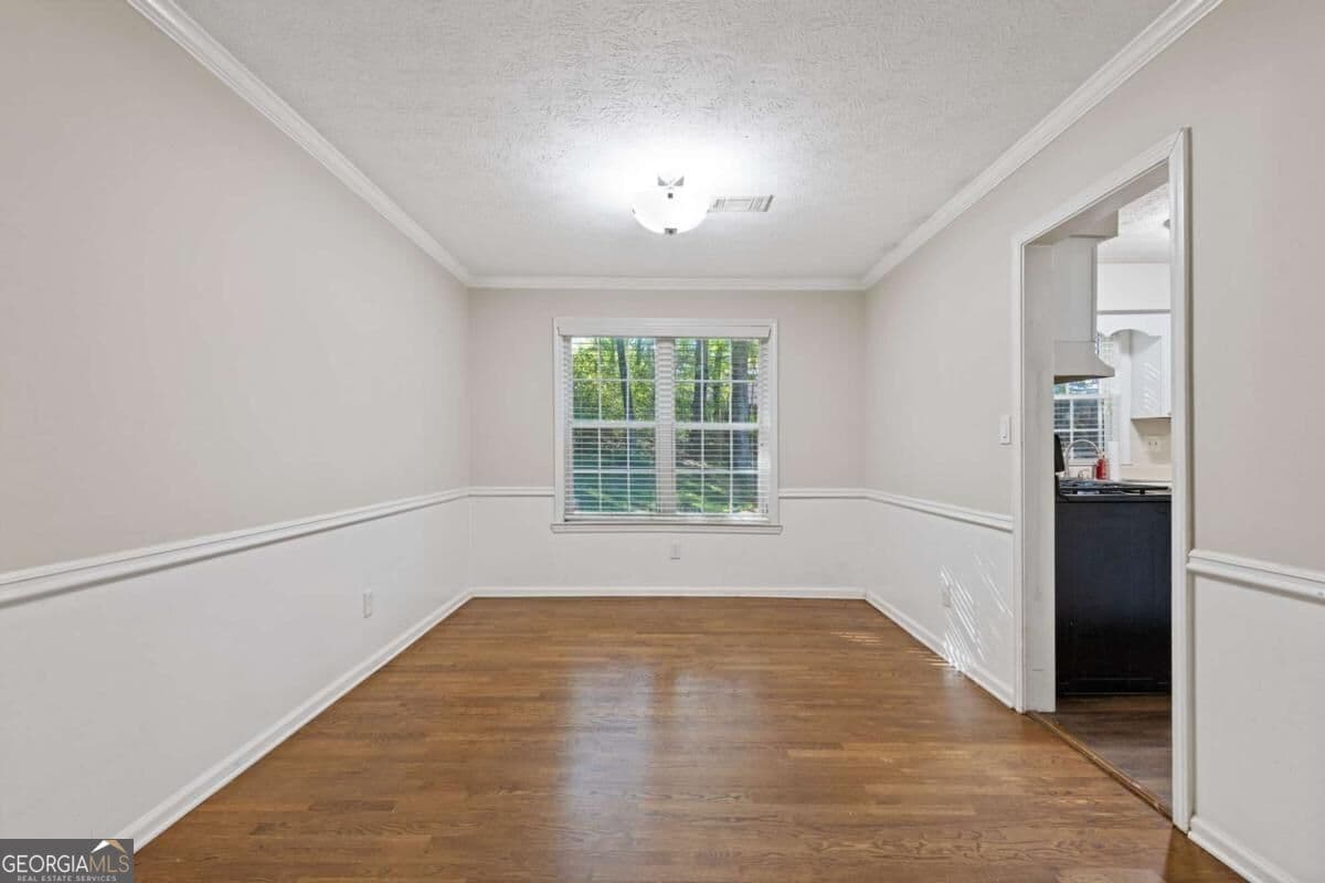 4 bedroom, 2.5 bathroom, 2,244 sq ft single family residence for sale at 3877 Peachtree Corners Circle, Peachtree Corners, GA 30092 — photo 7