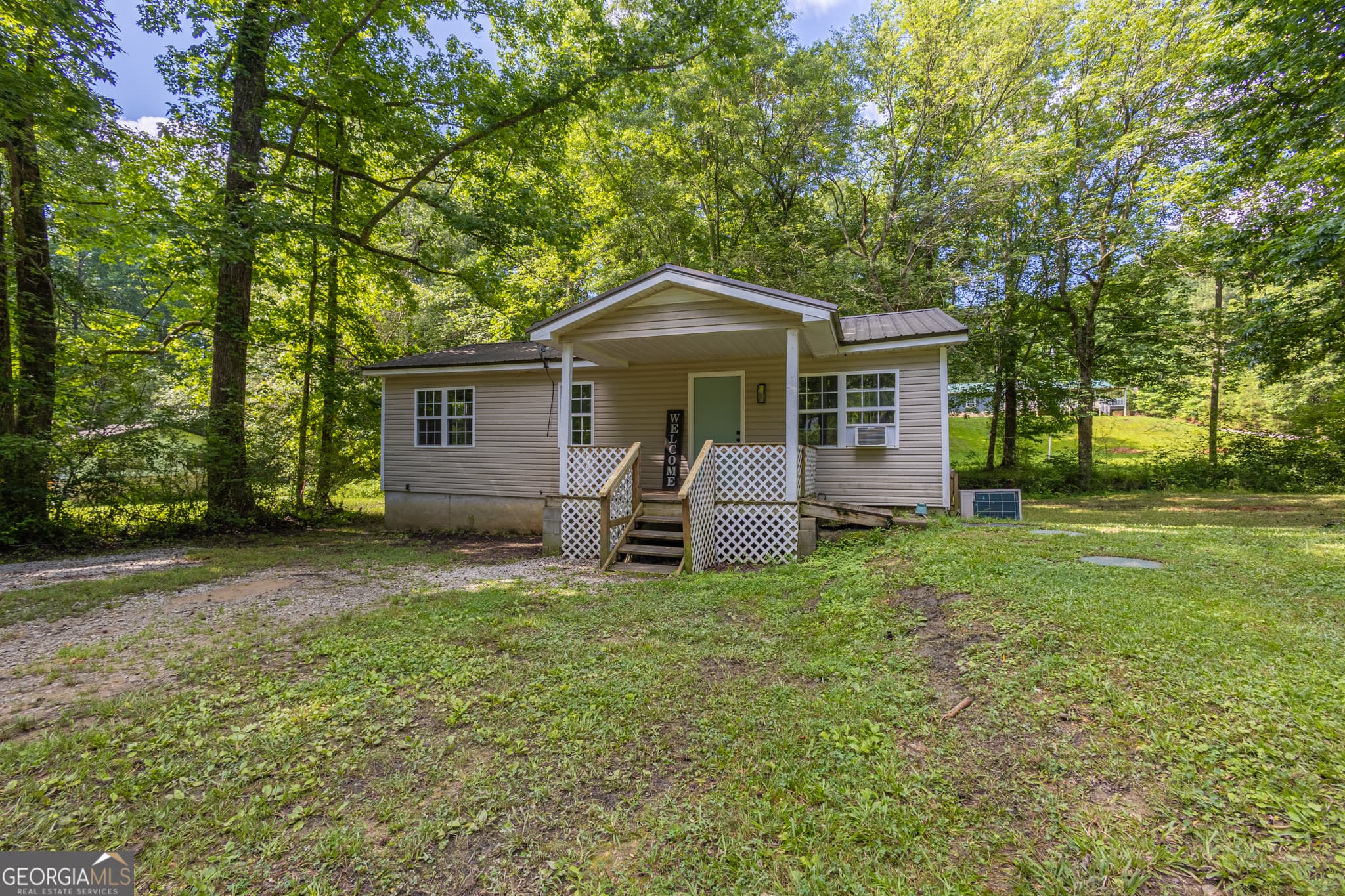 3 bedroom, 1 bathroom, 869 sq ft single family residence for sale at 717 County Road 137, Heflin, AL 36264 — photo 4