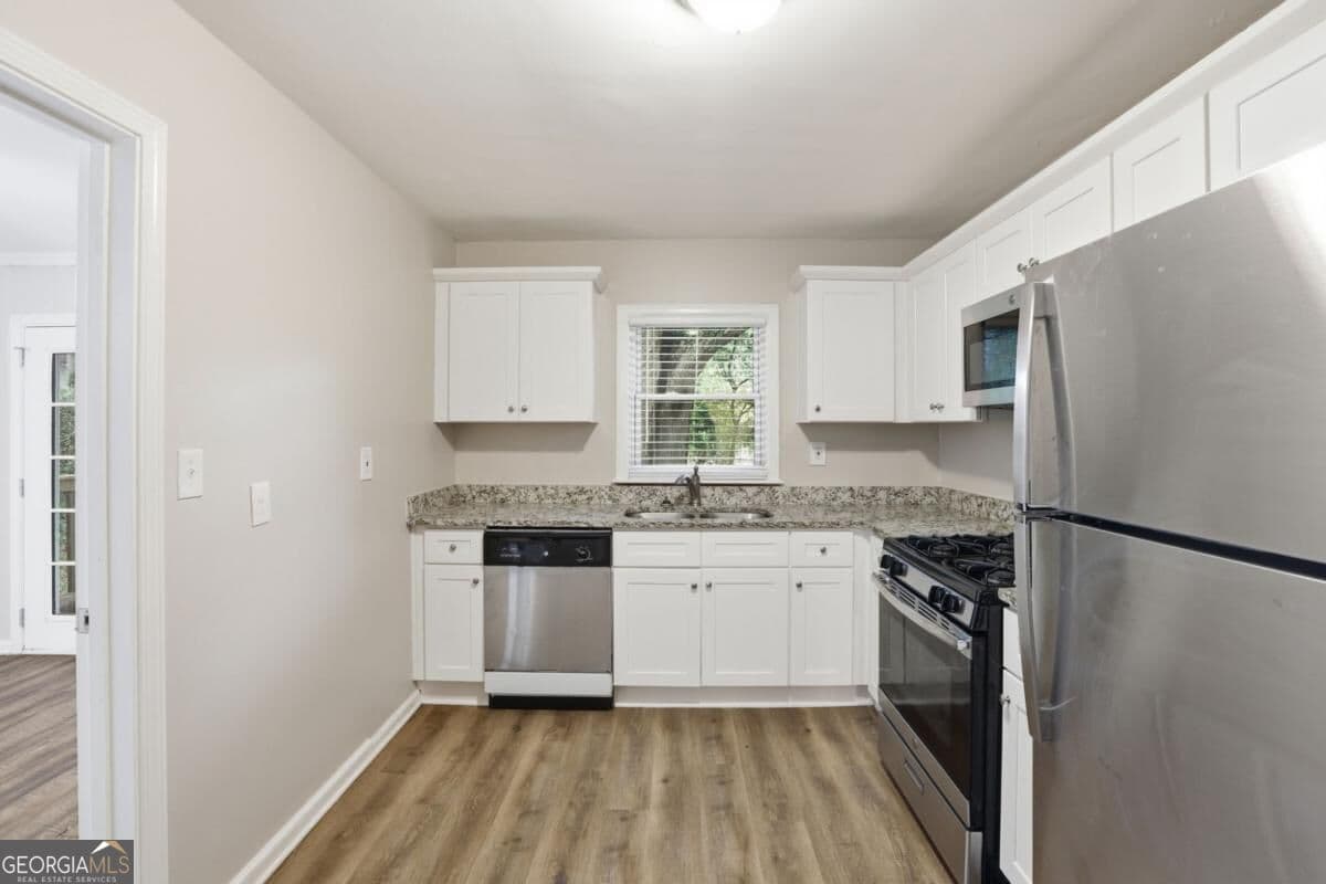 3 bedroom, 1 bathroom, 1,204 sq ft single family residence for sale at 2774 Wedgewood Terrace, Decatur, GA 30032 — photo 4