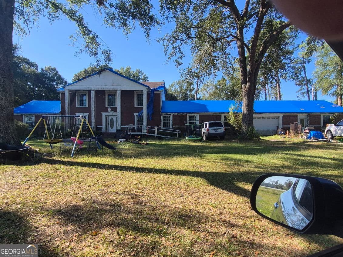 6 bedroom, 4.5 bathroom, 3,952 sq ft single family residence for sale at 18234 Valdosta Highway, Valdosta, GA 31602 — photo 2