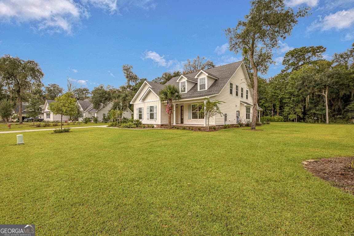 4 bedroom, 3.5 bathroom, 2,928 sq ft single family residence for sale at 164 Old Wharf Road, Brunswick, GA 31523 — photo 4