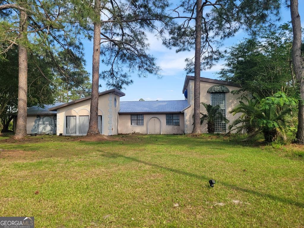 6 bedroom, 4 bathroom, 4,042 sq ft residential sold at 997 County Farm Road, Baxley, GA 31545