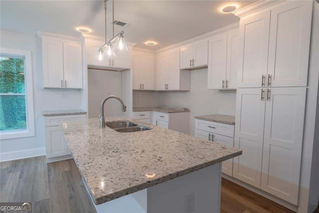 5 bedroom, 3 bathroom, 2,576 sq ft single family residence for sale at 2128 Kimberly Road, Atlanta, GA 30331 — photo 5