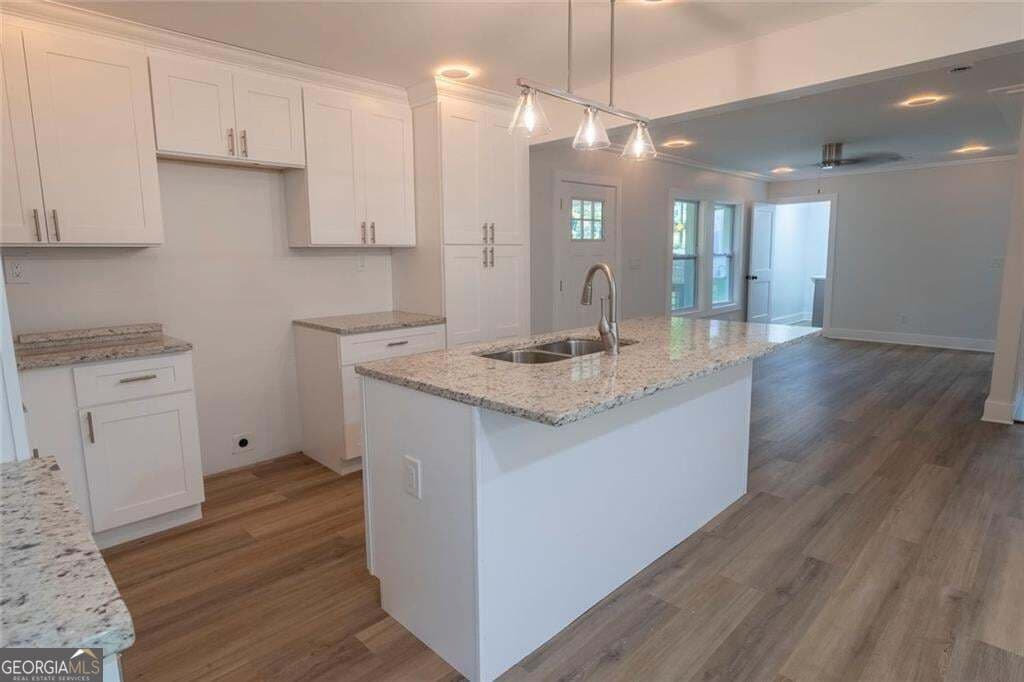 5 bedroom, 3 bathroom, 2,576 sq ft single family residence for sale at 2128 Kimberly Road, Atlanta, GA 30331 — photo 4
