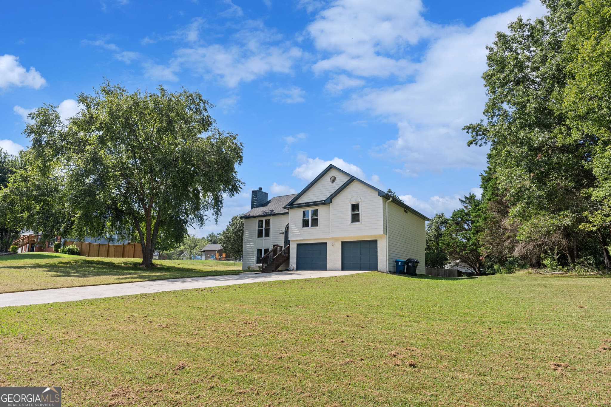 4 bedroom, 3 bathroom, 2,014 sq ft single family residence for sale at 4650 Wheeler Creek Drive, Hoschton, GA 30548 — photo 2