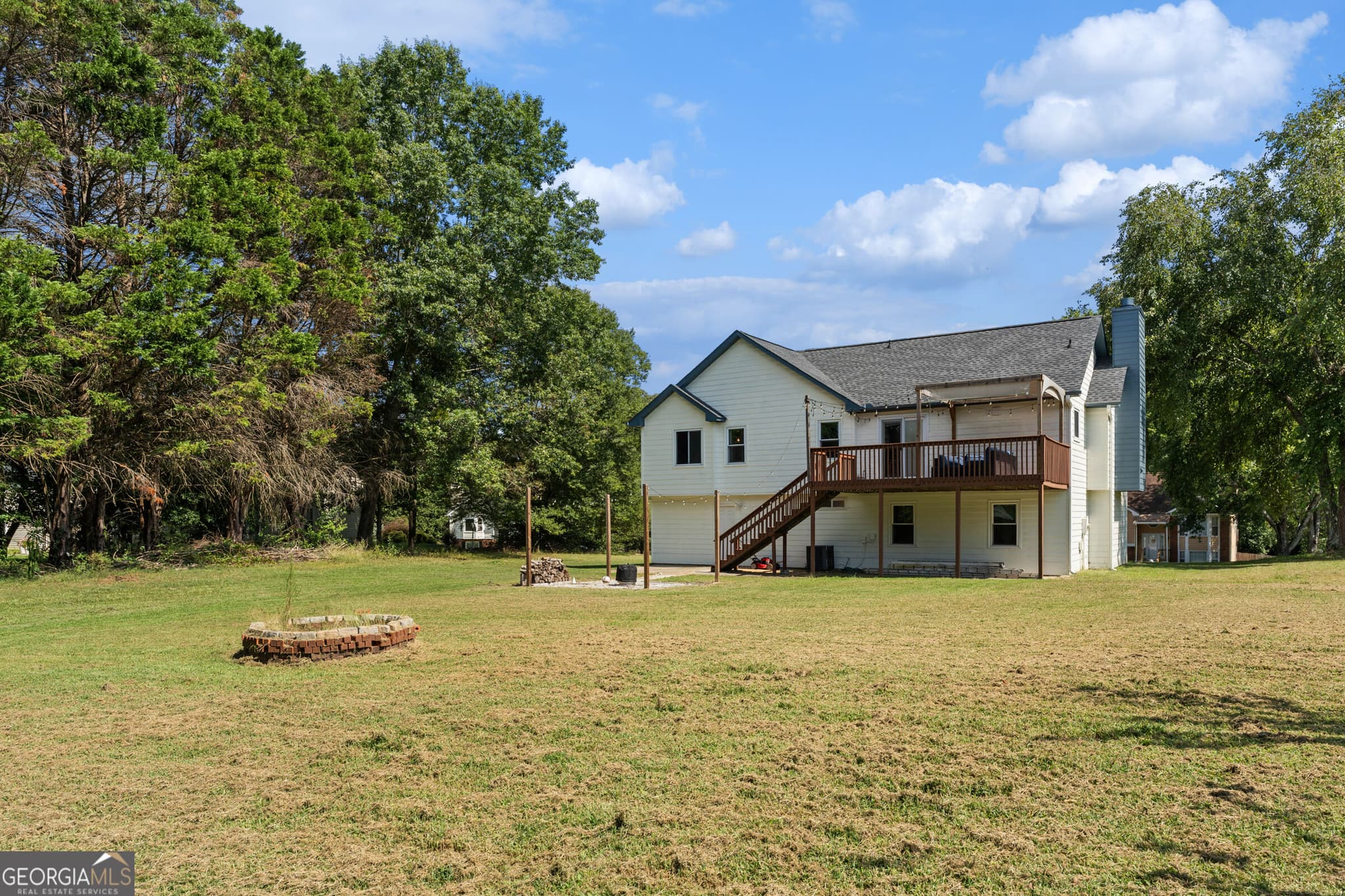 4 bedroom, 3 bathroom, 2,014 sq ft single family residence for sale at 4650 Wheeler Creek Drive, Hoschton, GA 30548 — photo 3