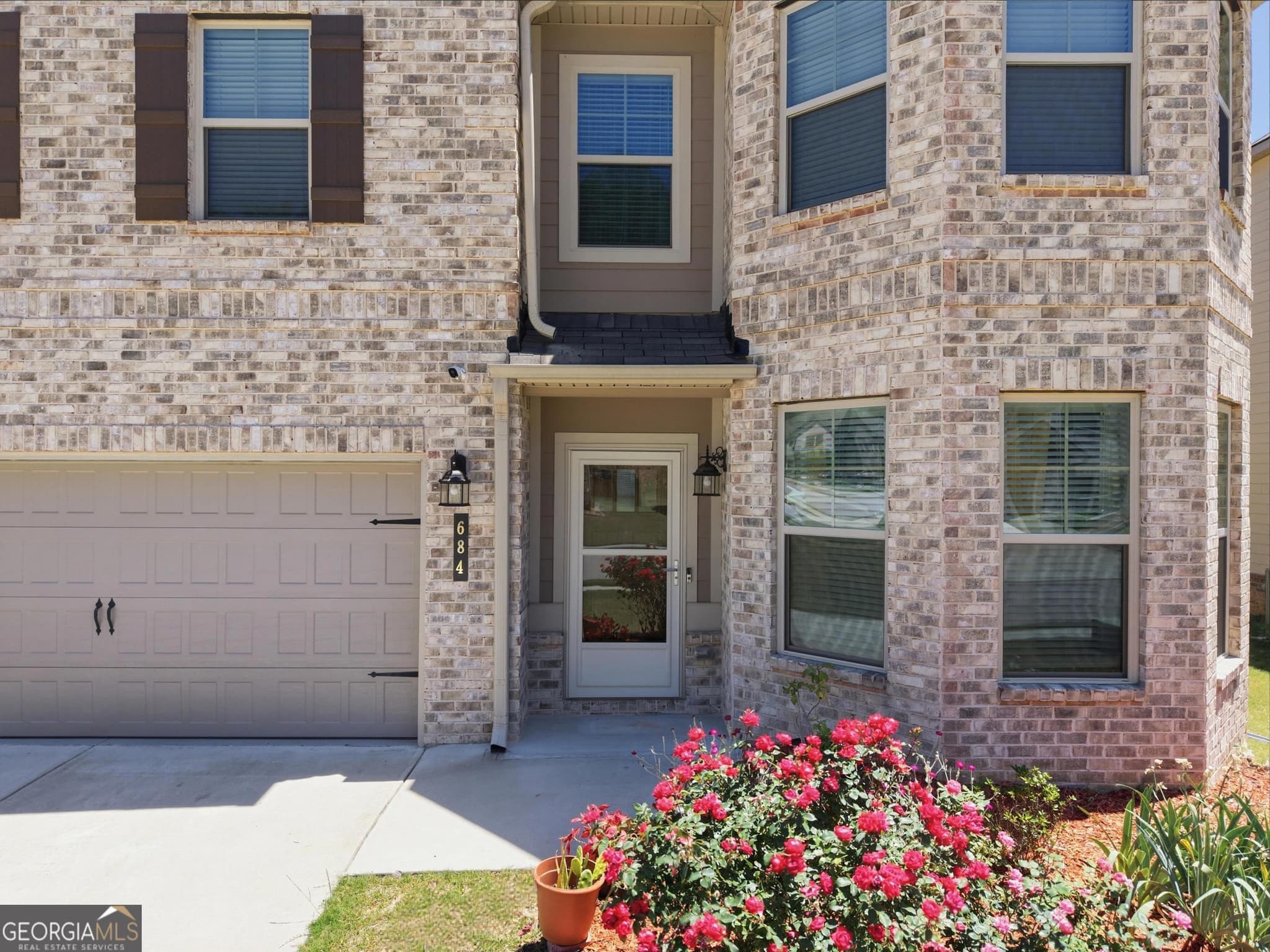 5 bedroom, 3 bathroom, 3,188 sq ft single family residence for sale at 684 Lakehaven Lane, Loganville, GA 30052 — photo 3