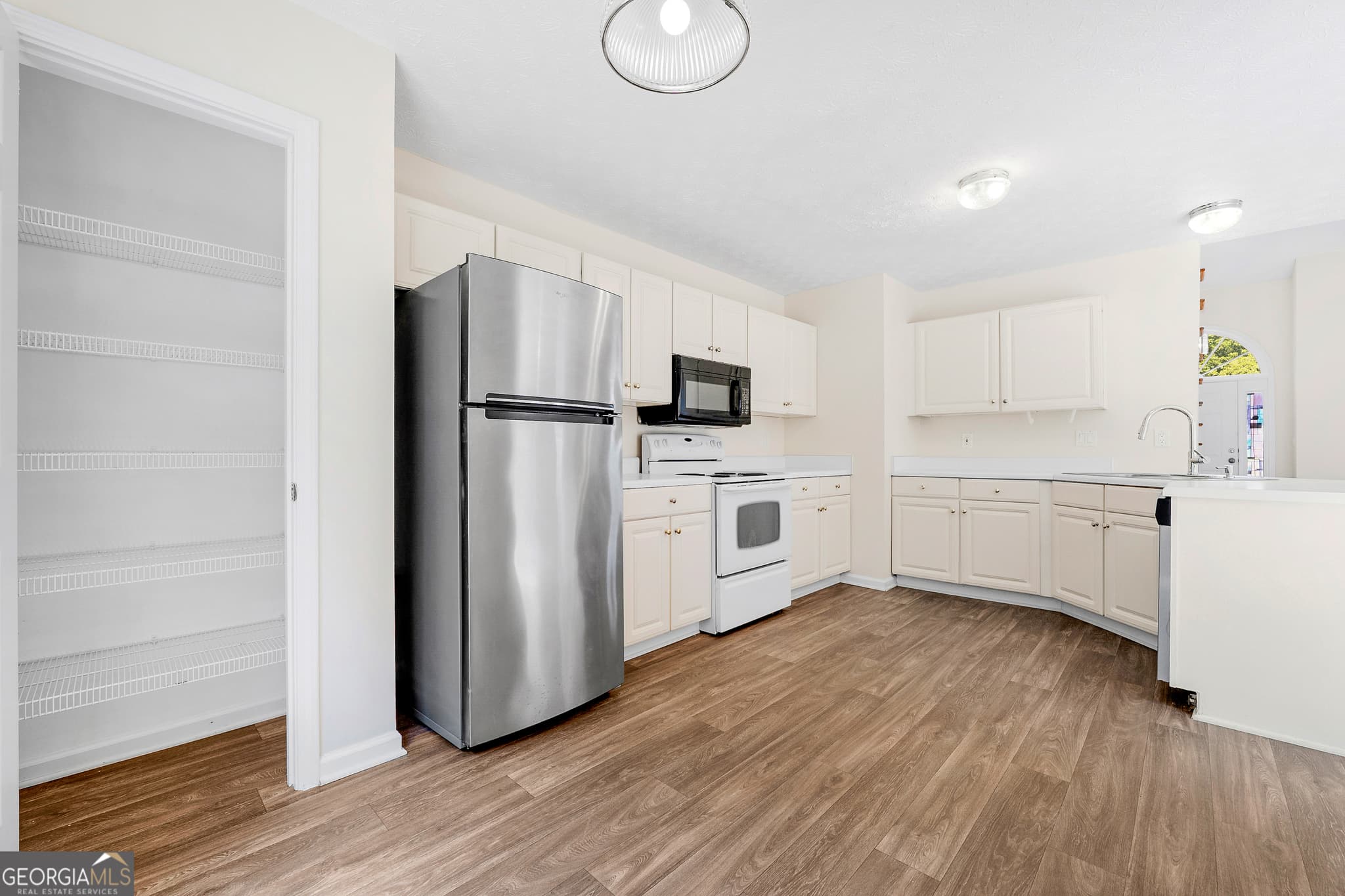 3 bedroom, 2.5 bathroom, 1,627 sq ft single family residence for sale at 12270 Players Court, Fayetteville, GA 30215 — photo 7