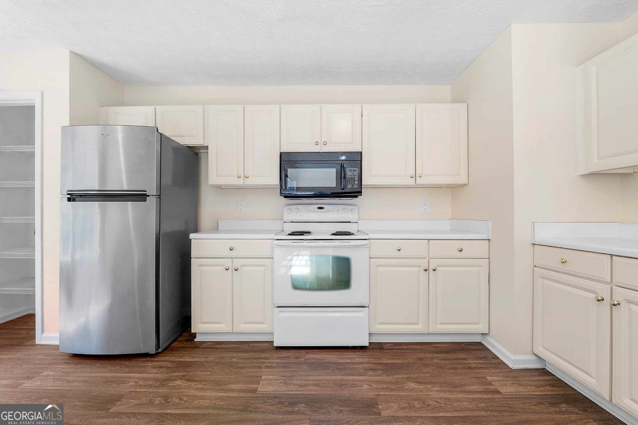 3 bedroom, 2.5 bathroom, 1,627 sq ft single family residence for sale at 12270 Players Court, Fayetteville, GA 30215 — photo 8