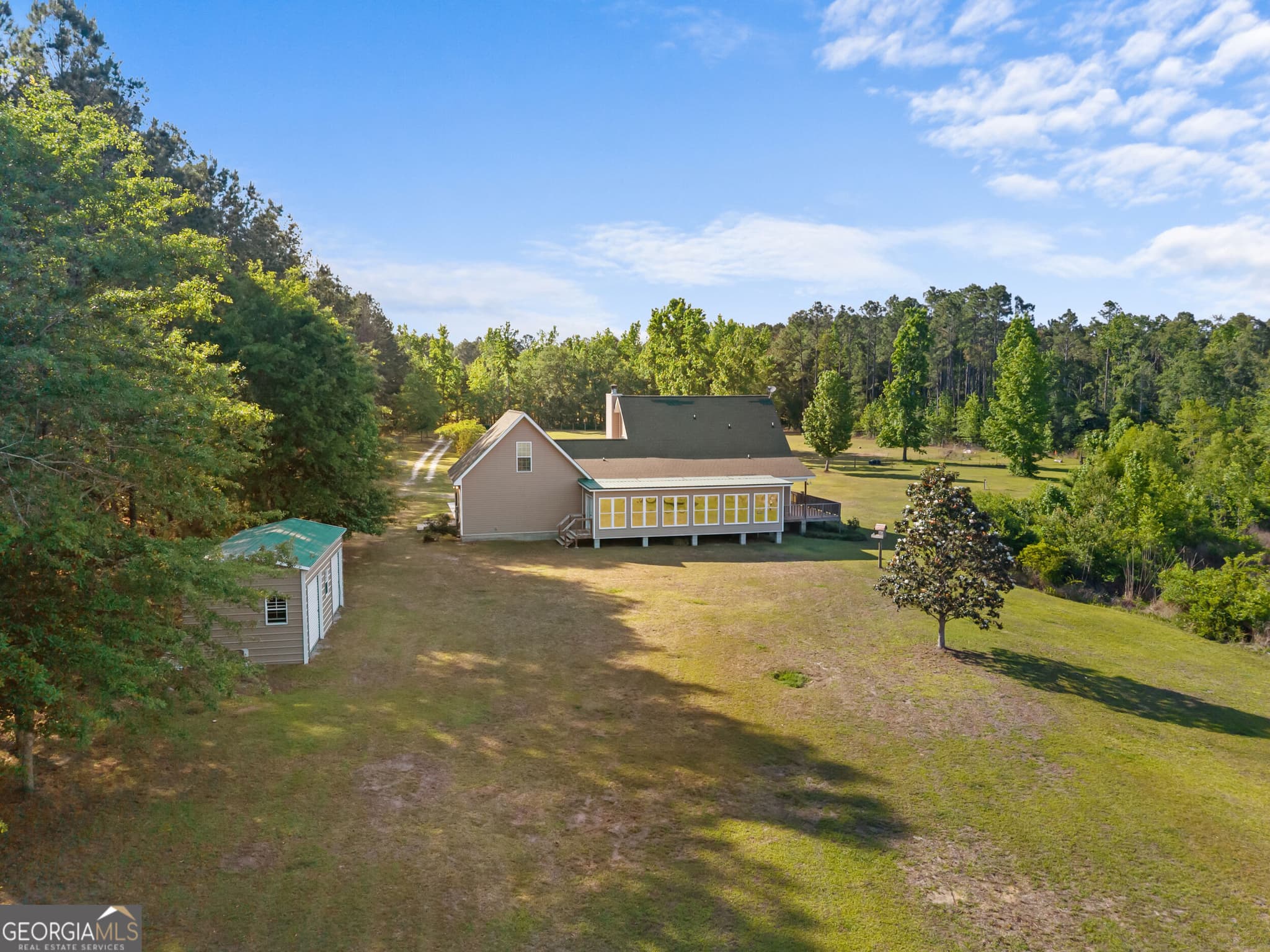 3 bedroom, 2.5 bathroom, 3,415 sq ft single family residence for sale at 452 Joe Oglesby Road, Portal, GA 30450 — photo 5