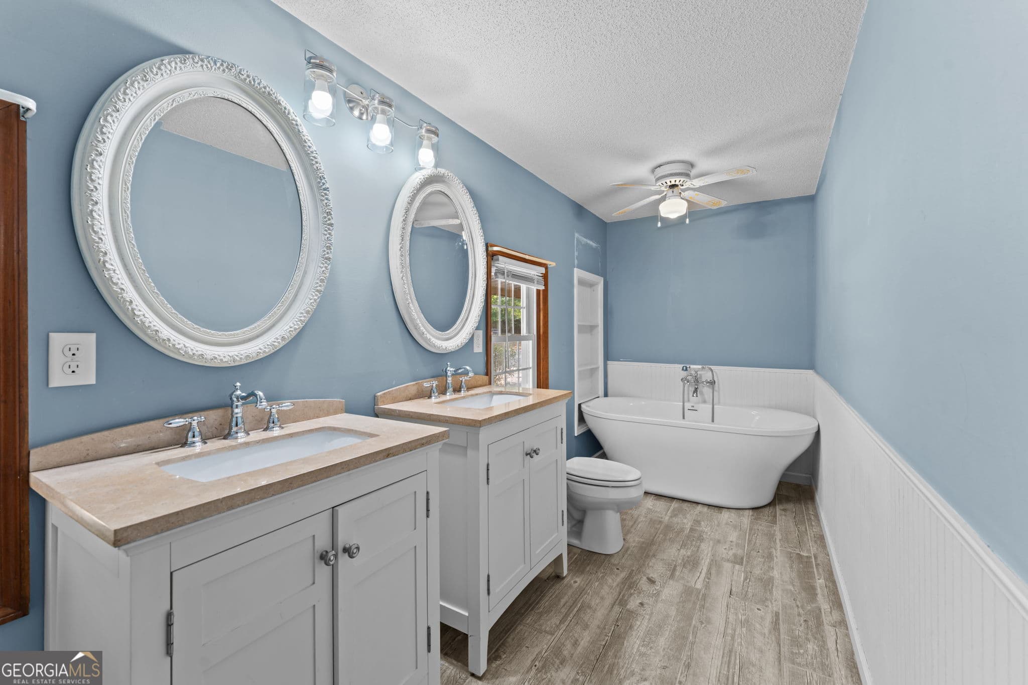 5 bedroom, 4 bathroom, 3,204 sq ft single family residence for sale at 5682 Hartley Bridge Road, Macon, GA 31216 — photo 2