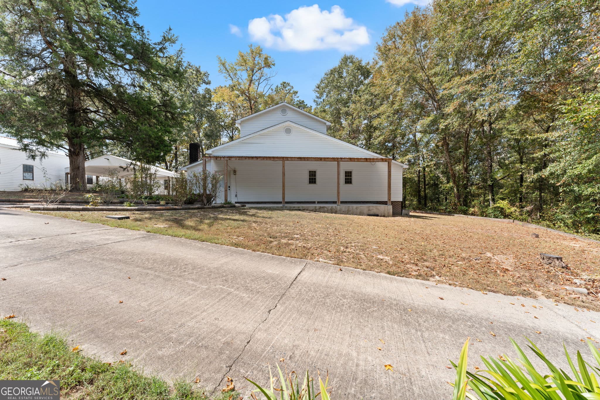 5 bedroom, 4 bathroom, 3,204 sq ft single family residence for sale at 5682 Hartley Bridge Road, Macon, GA 31216 — photo 6