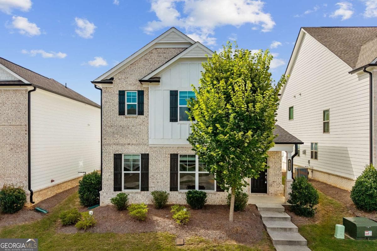 4 bedroom, 2.5 bathroom, 2,435 sq ft single family residence for sale at 4335 Magpie Drive, Hoschton, GA 30548 — photo 1 of 26