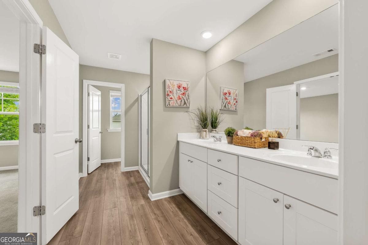 4 bedroom, 2.5 bathroom, 2,435 sq ft single family residence for sale at 4335 Magpie Drive, Hoschton, GA 30548 — photo 5