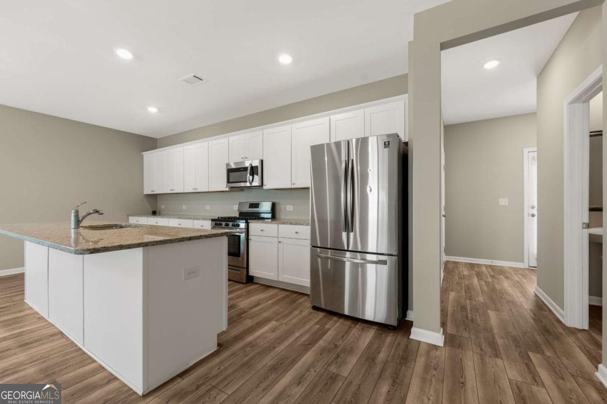 4 bedroom, 2.5 bathroom, 2,435 sq ft single family residence for sale at 4335 Magpie Drive, Hoschton, GA 30548 — photo 10