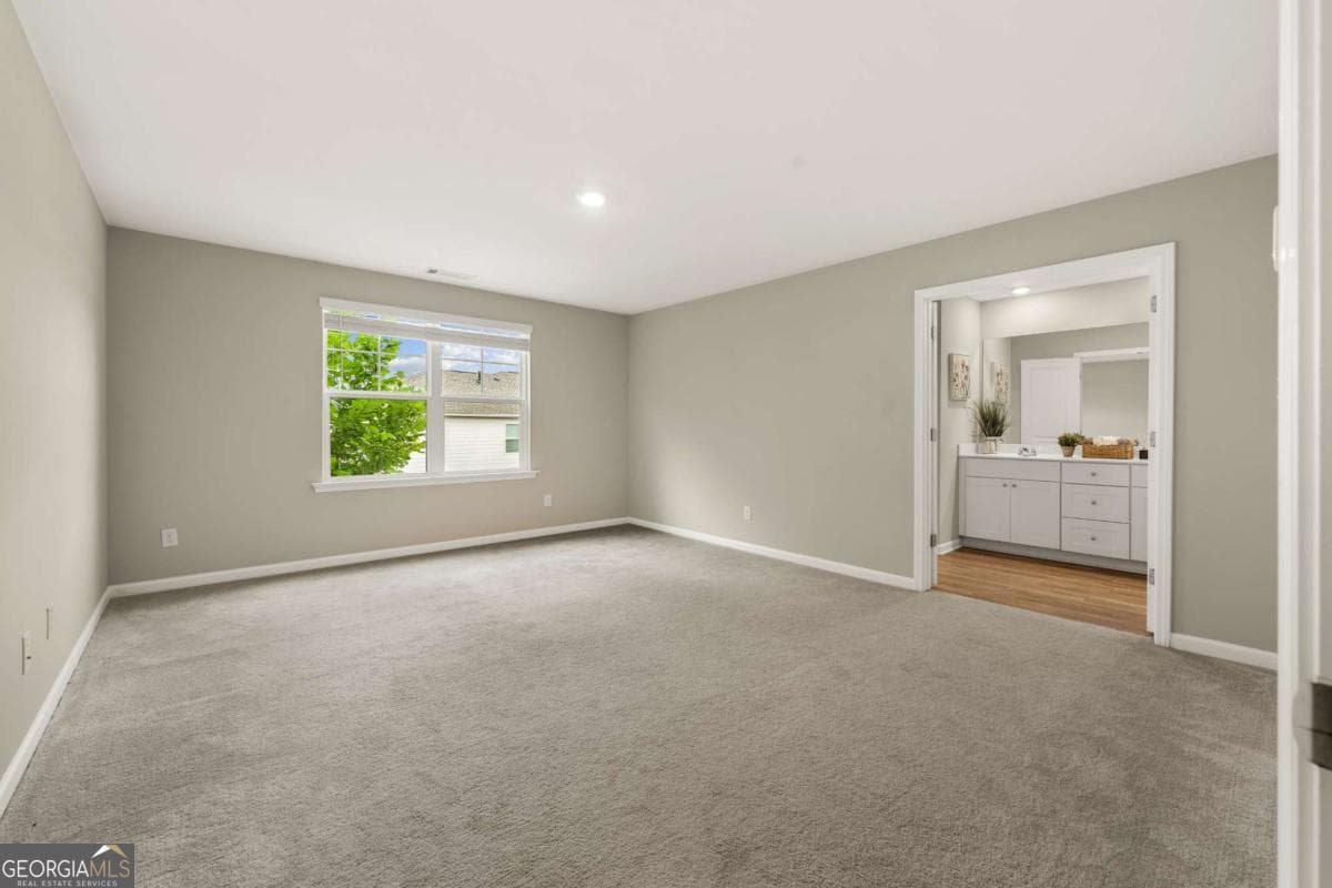 4 bedroom, 2.5 bathroom, 2,435 sq ft single family residence for sale at 4335 Magpie Drive, Hoschton, GA 30548 — photo 4