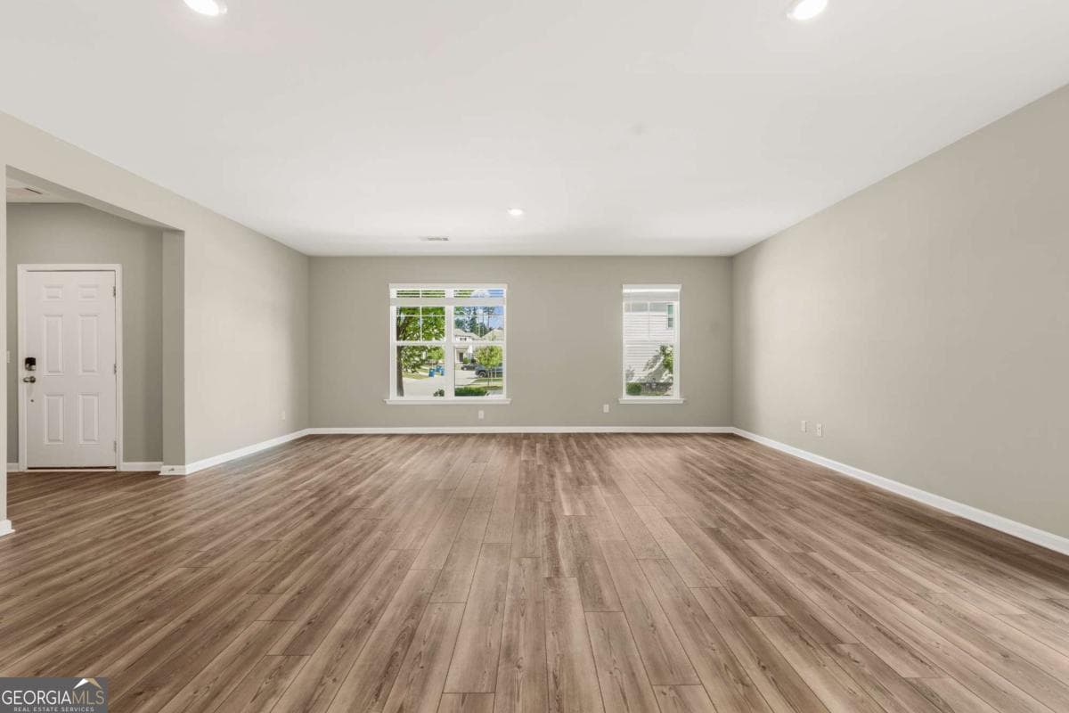 4 bedroom, 2.5 bathroom, 2,435 sq ft single family residence for sale at 4335 Magpie Drive, Hoschton, GA 30548 — photo 8