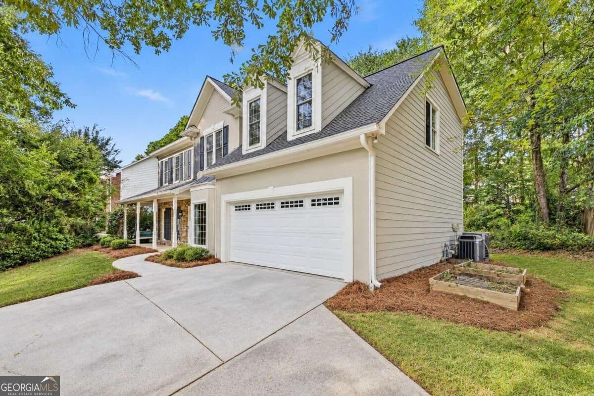4 bedroom, 2.5 bathroom, 2,171 sq ft single family residence for sale at 1315 Tuxedo Court, Lawrenceville, GA 30043 — photo 2
