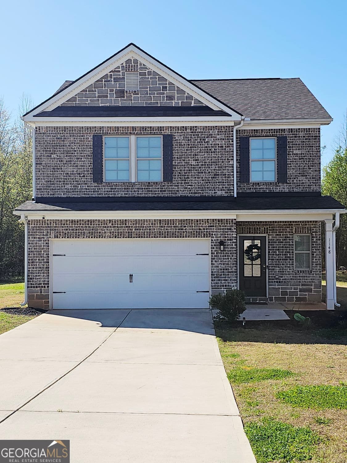4 bedroom, 2.5 bathroom, 1,830 sq ft single family residence for sale at 1148 Burgundy Drive, Griffin, GA 30223 — photo 2