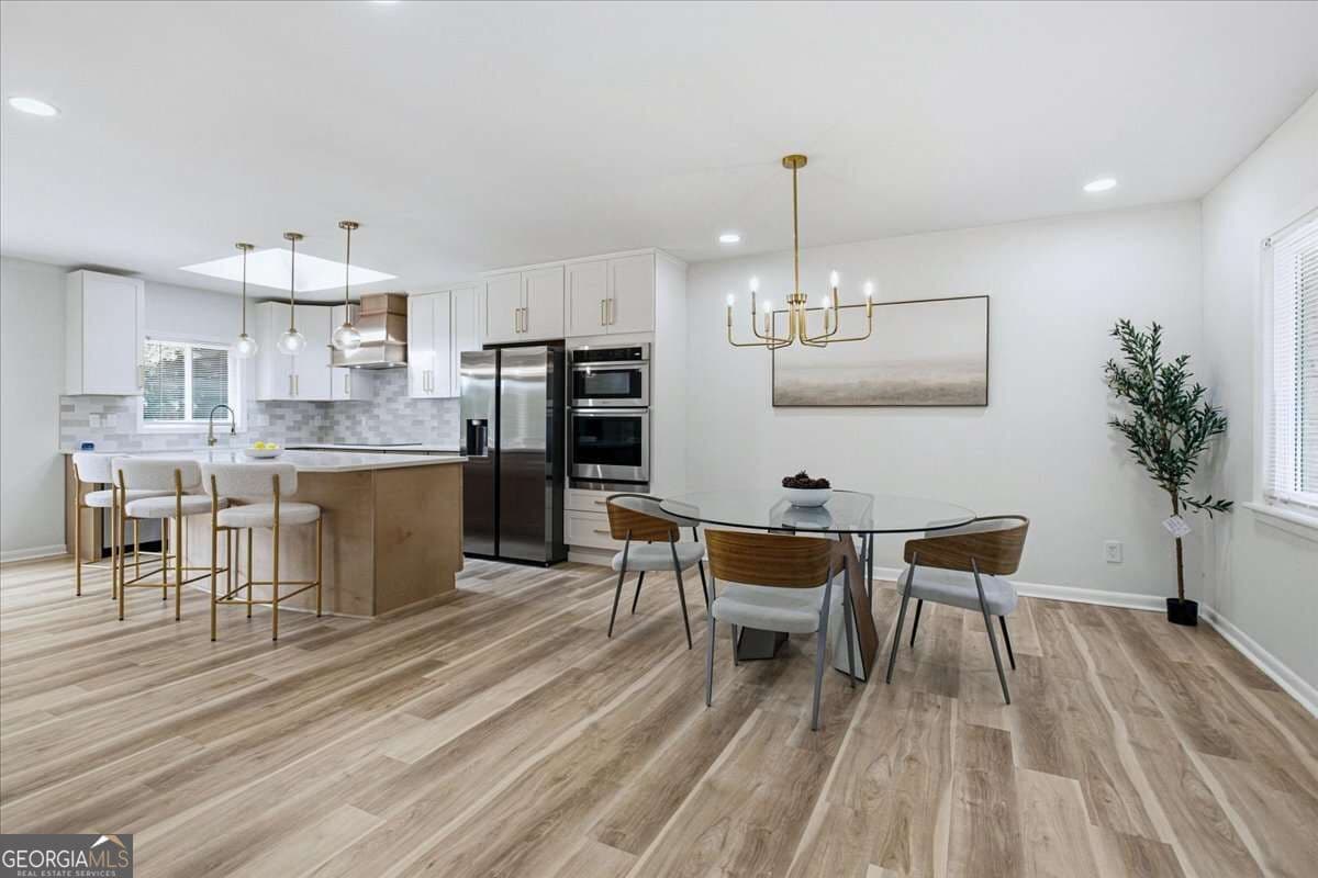 6 bedroom, 4 bathroom single family residence for sale at 3130 Henderson Mill Road, Atlanta, GA 30341 — photo 6