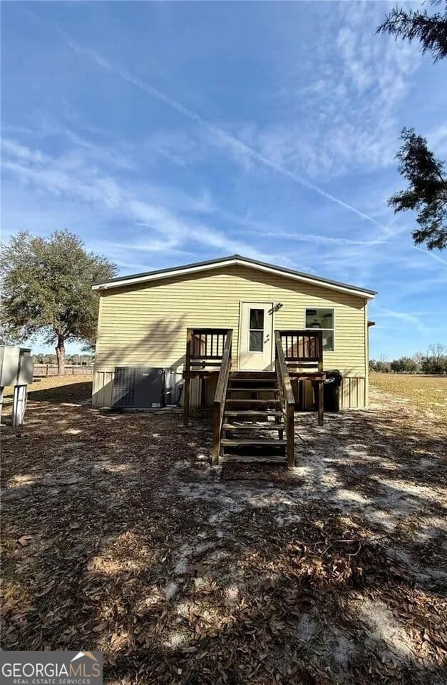 5 bedroom, 3 bathroom, 1,728 sq ft manufactured home,single family residence for sale at 27910 NW 46th Avenue, Newberry, FL 32669 — photo 5