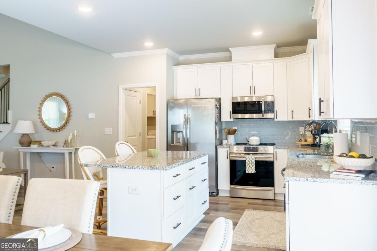 4 bedroom, 2.5 bathroom, 1,794 sq ft single family residence for sale at 398 Sunset Drive, Statham, GA 30666 — photo 5