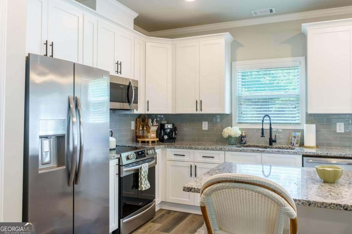 4 bedroom, 2.5 bathroom, 1,794 sq ft single family residence for sale at 398 Sunset Drive, Statham, GA 30666 — photo 8