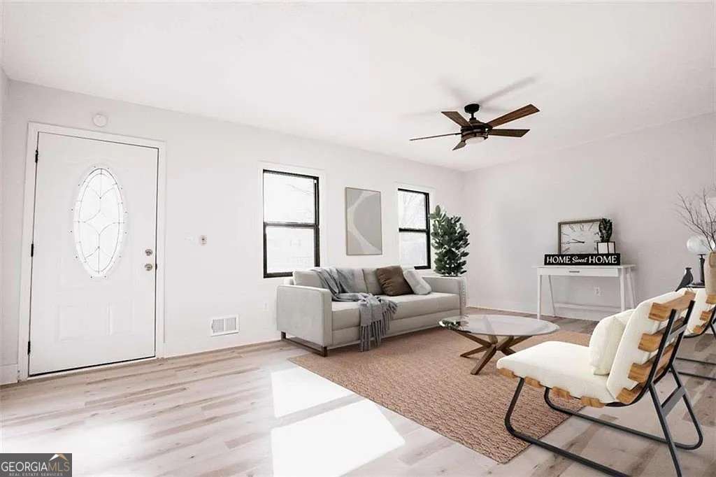 3 bedroom, 2 bathroom, 1,924 sq ft single family residence for sale at 2688 Heritage Lane, Morrow, GA 30260 — photo 5