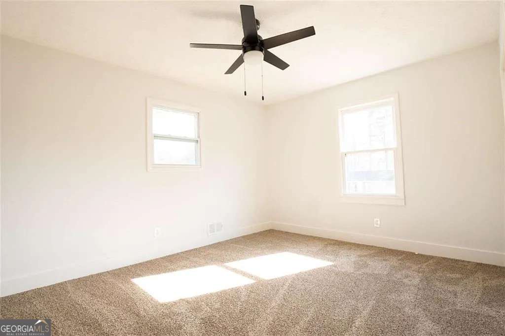 3 bedroom, 2 bathroom, 1,924 sq ft single family residence for sale at 2688 Heritage Lane, Morrow, GA 30260 — photo 9
