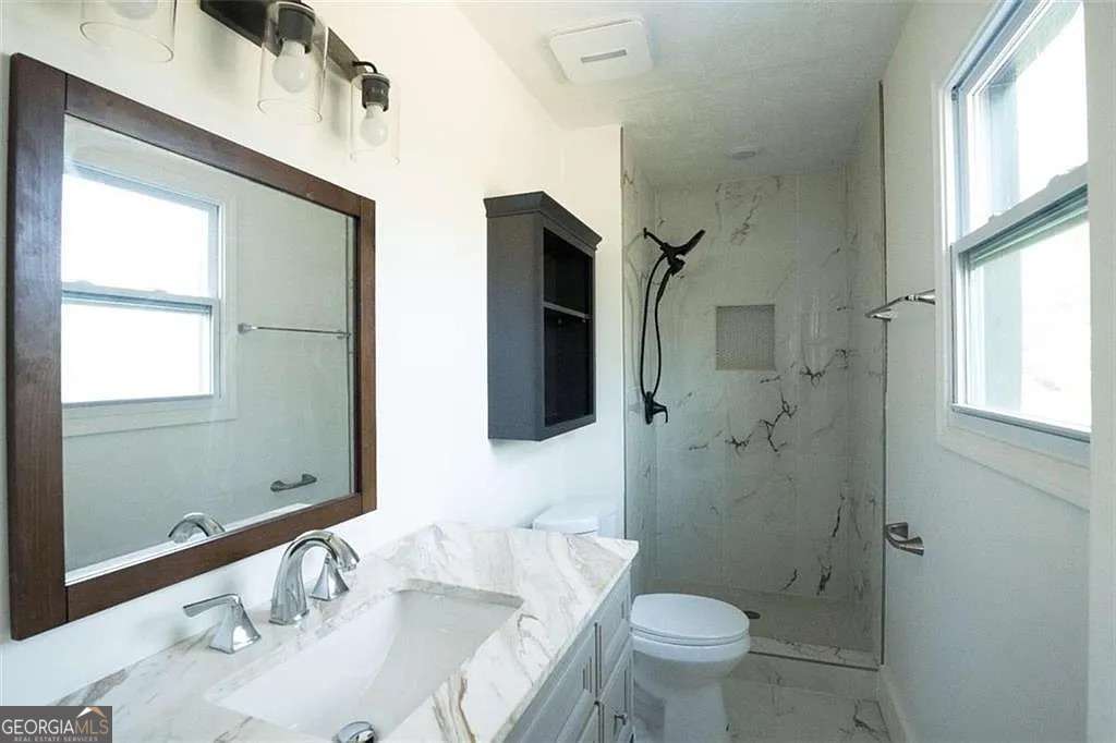 3 bedroom, 2 bathroom, 1,924 sq ft single family residence for sale at 2688 Heritage Lane, Morrow, GA 30260 — photo 8