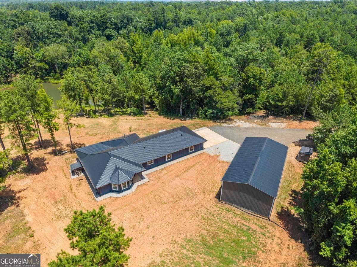 3 bedroom, 2 bathroom, 2,232 sq ft single family residence for sale at 862 Monticello Road, Eatonton, GA 31024 — photo 1 of 24
