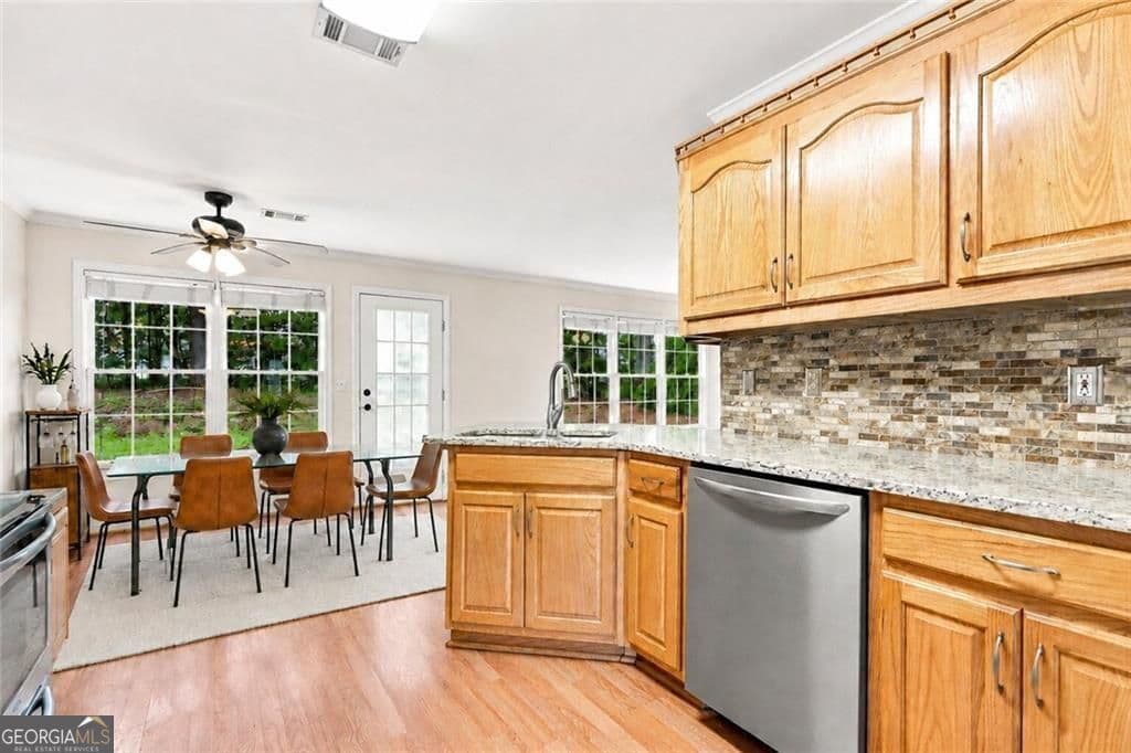 4 bedroom, 2.5 bathroom, 2,344 sq ft single family residence for sale at 2232 Woodbriar Drive, Buford, GA 30518 — photo 4
