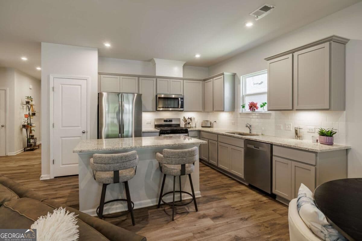 3 bedroom, 2 bathroom, 1,702 sq ft single family residence for sale at 671 Pineberry Court, Grayson, GA 30017 — photo 6