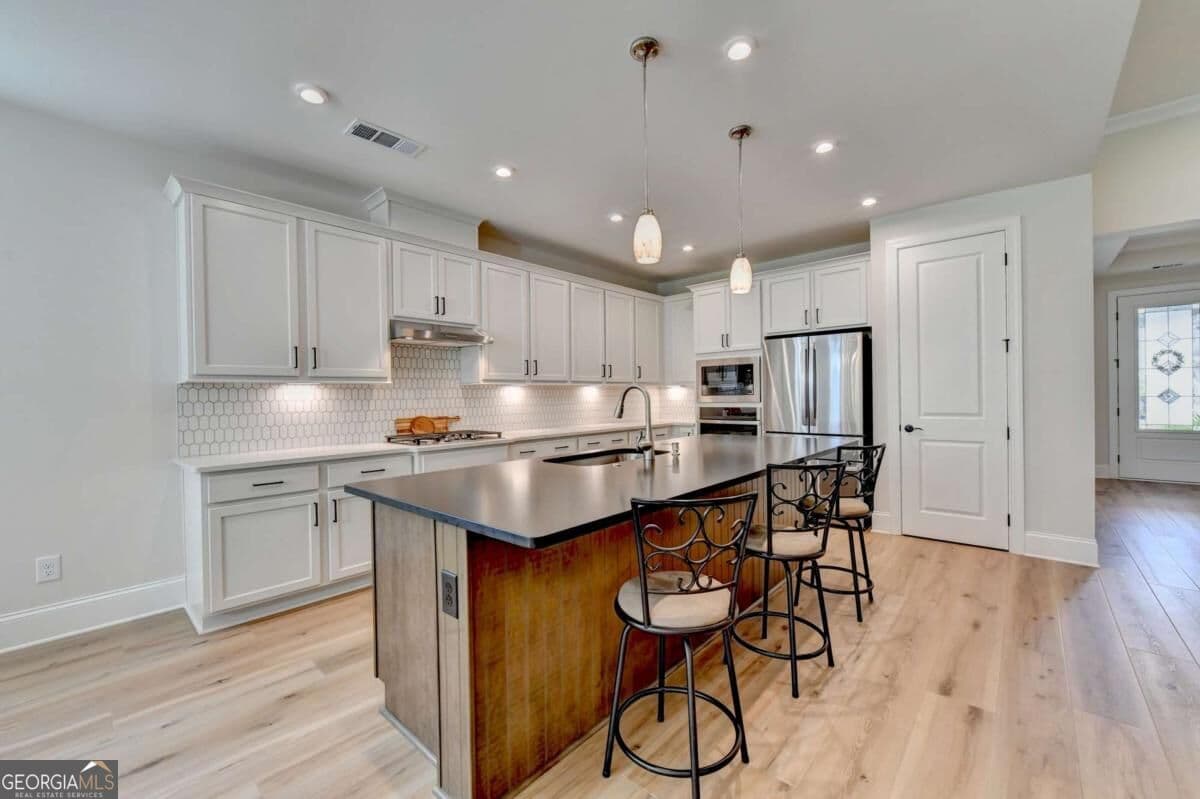 3 bedroom, 3.5 bathroom, 2,852 sq ft single family residence for sale at 295 Conway Trail, Hoschton, GA 30548 — photo 2