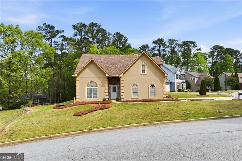 3 bedroom, 2.5 bathroom, 2,016 sq ft single family residence for sale at 1787 Wedgewood Drive, Stone Mountain, GA 30088 — photo 1 of 15