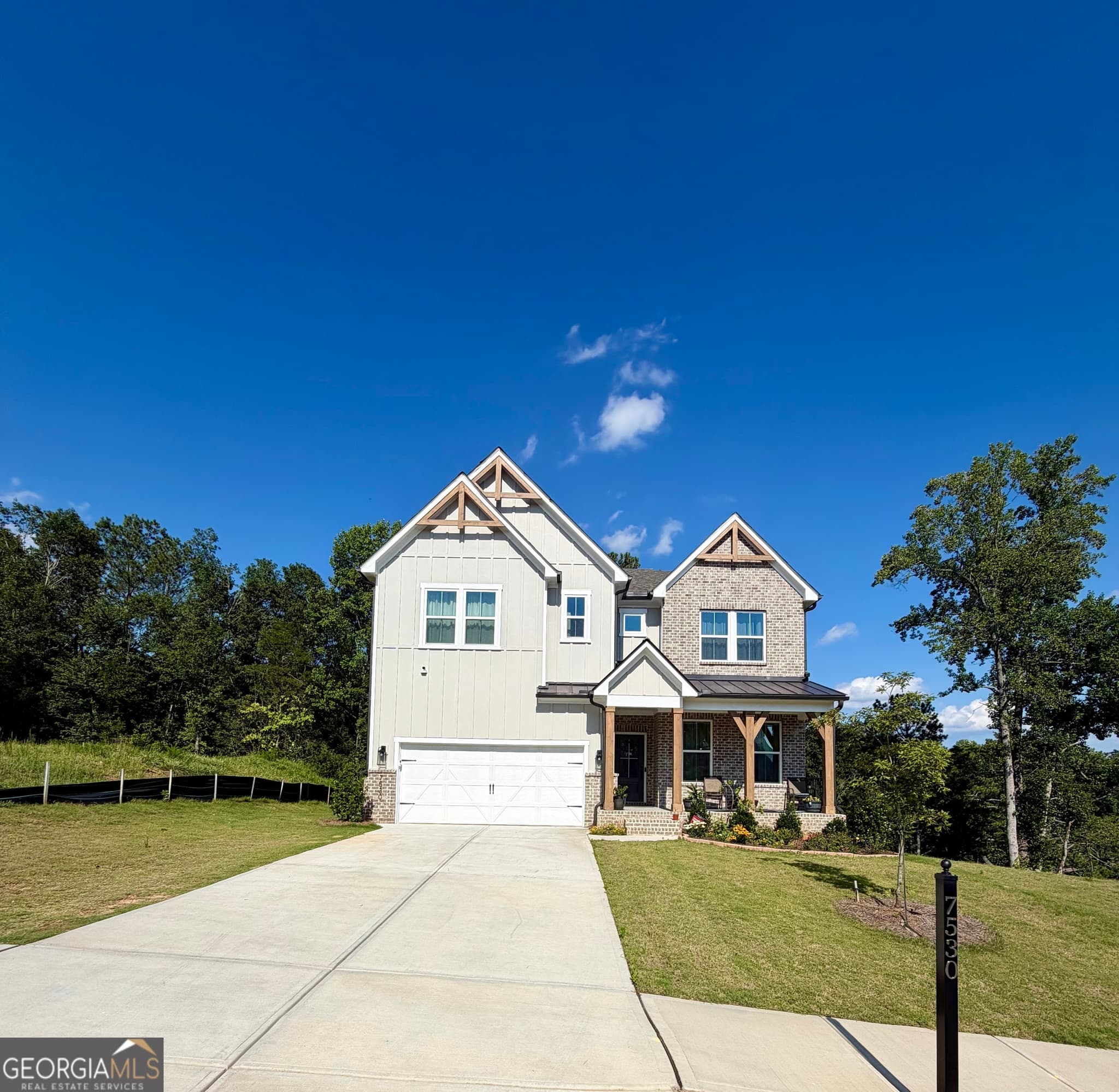 6 bedroom, 5.5 bathroom, 4,750 sq ft single family residence for sale at 7530 W Homer Drive, Cumming, GA 30028