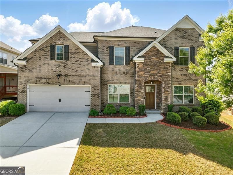 5 bedroom, 3 bathroom, 2,965 sq ft single family residence sold at 345 Varenna Lane, Sugar Hill, GA 30518
