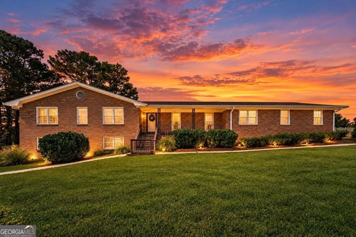 5 bedroom, 3 bathroom, 3,822 sq ft single family residence for sale at 2970 N Sharon Church Road, Loganville, GA 30052 — photo 1 of 86