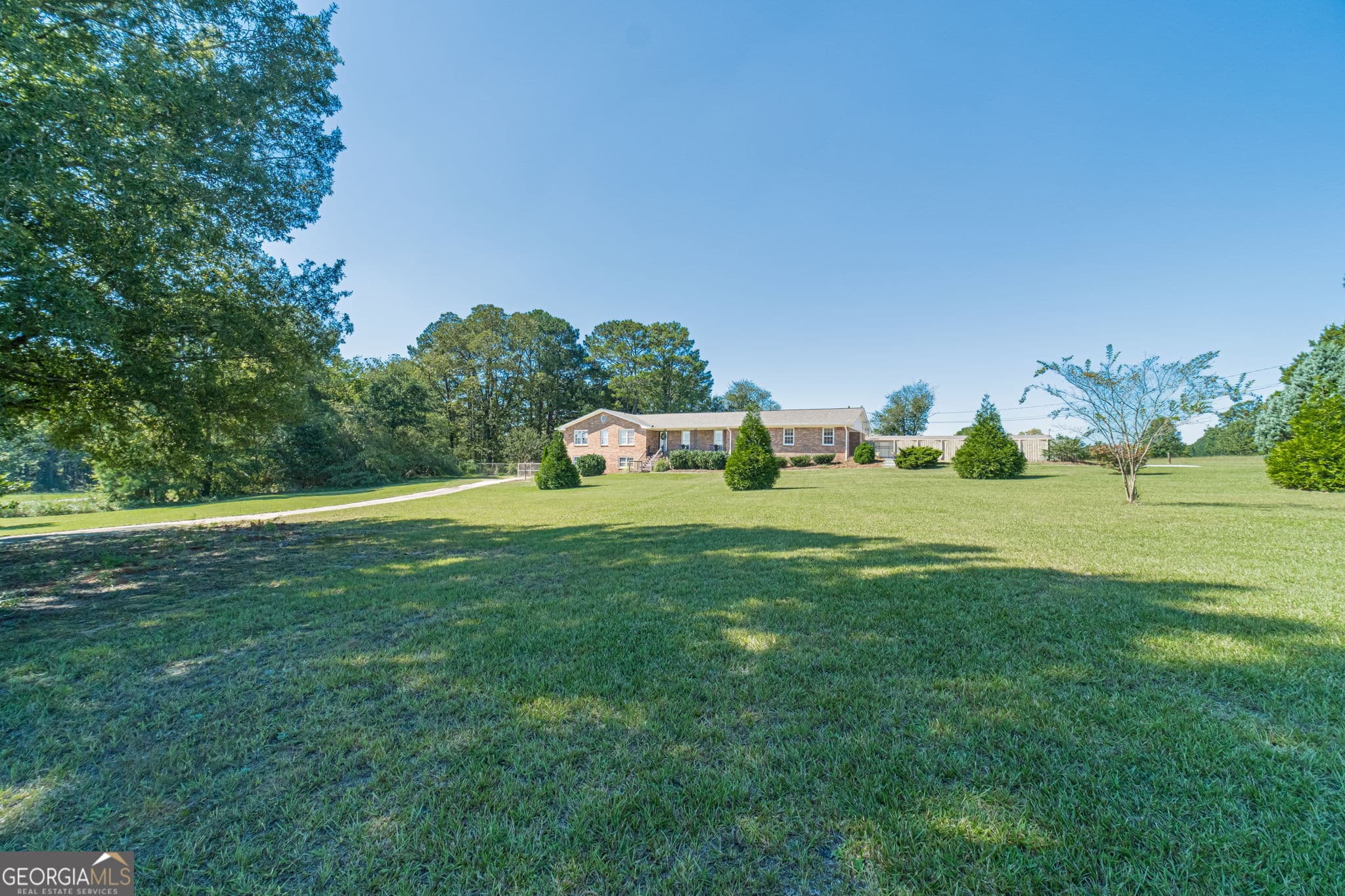 5 bedroom, 3 bathroom, 3,822 sq ft single family residence for sale at 2970 N Sharon Church Road, Loganville, GA 30052 — photo 4