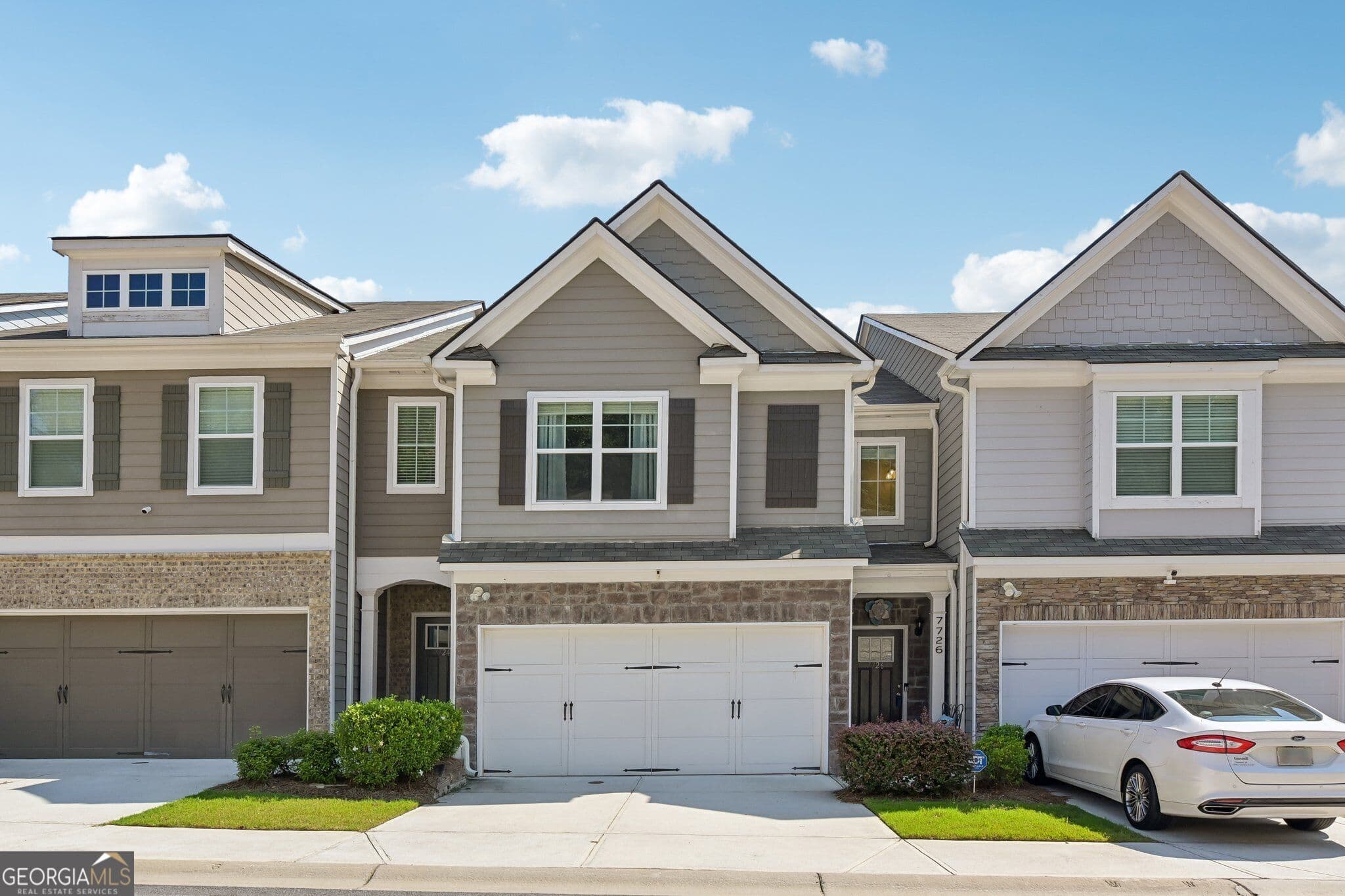 3 bedroom, 2.5 bathroom, 1,932 sq ft townhouse for sale at 7726 Baron Road, Fairburn, GA 30213 — photo 1 of 27
