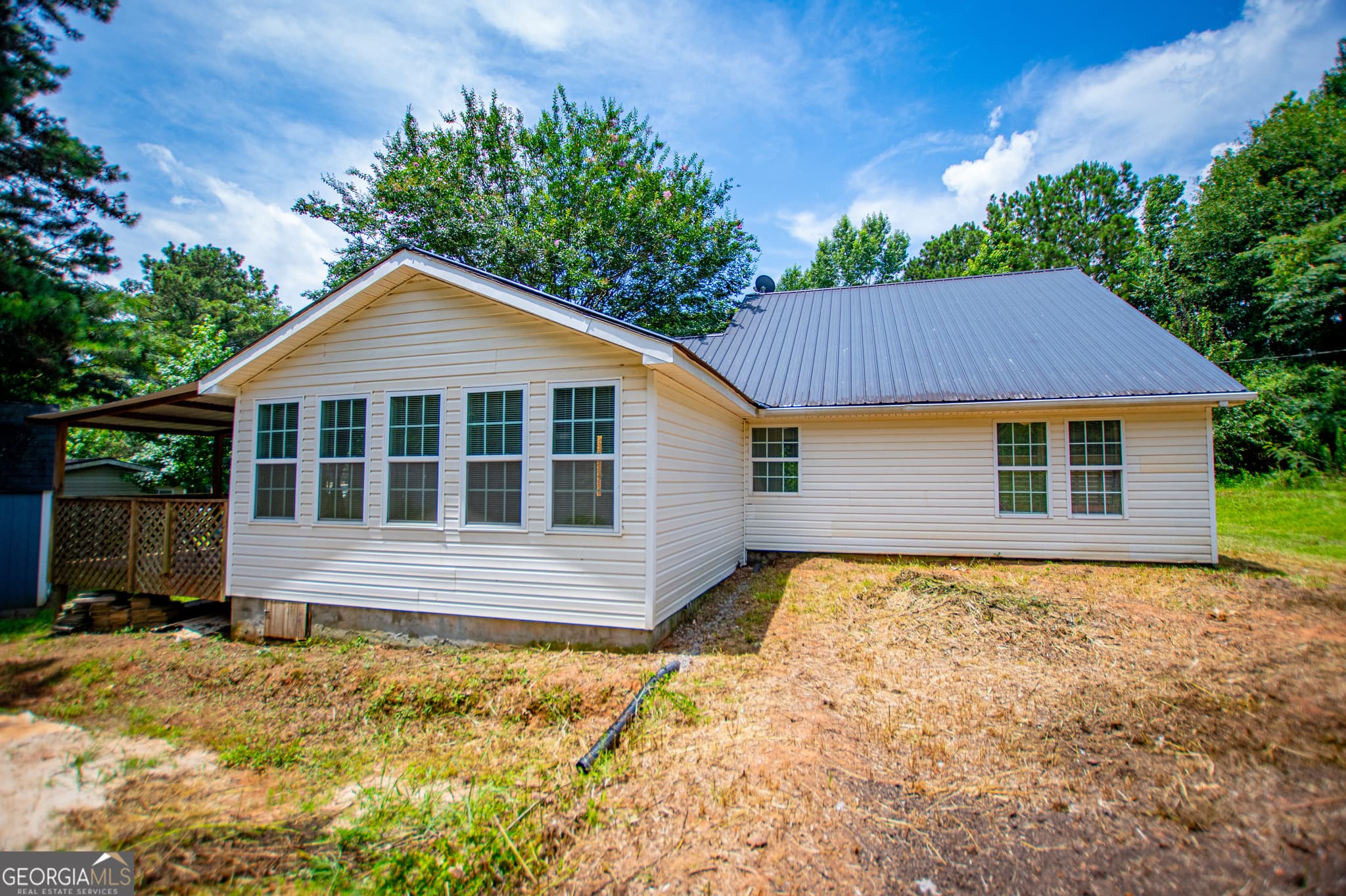 3 bedroom, 1.5 bathroom, 1,419 sq ft single family residence for sale at 445 Gum Creek Circle, Roopville, GA 30170 — photo 4