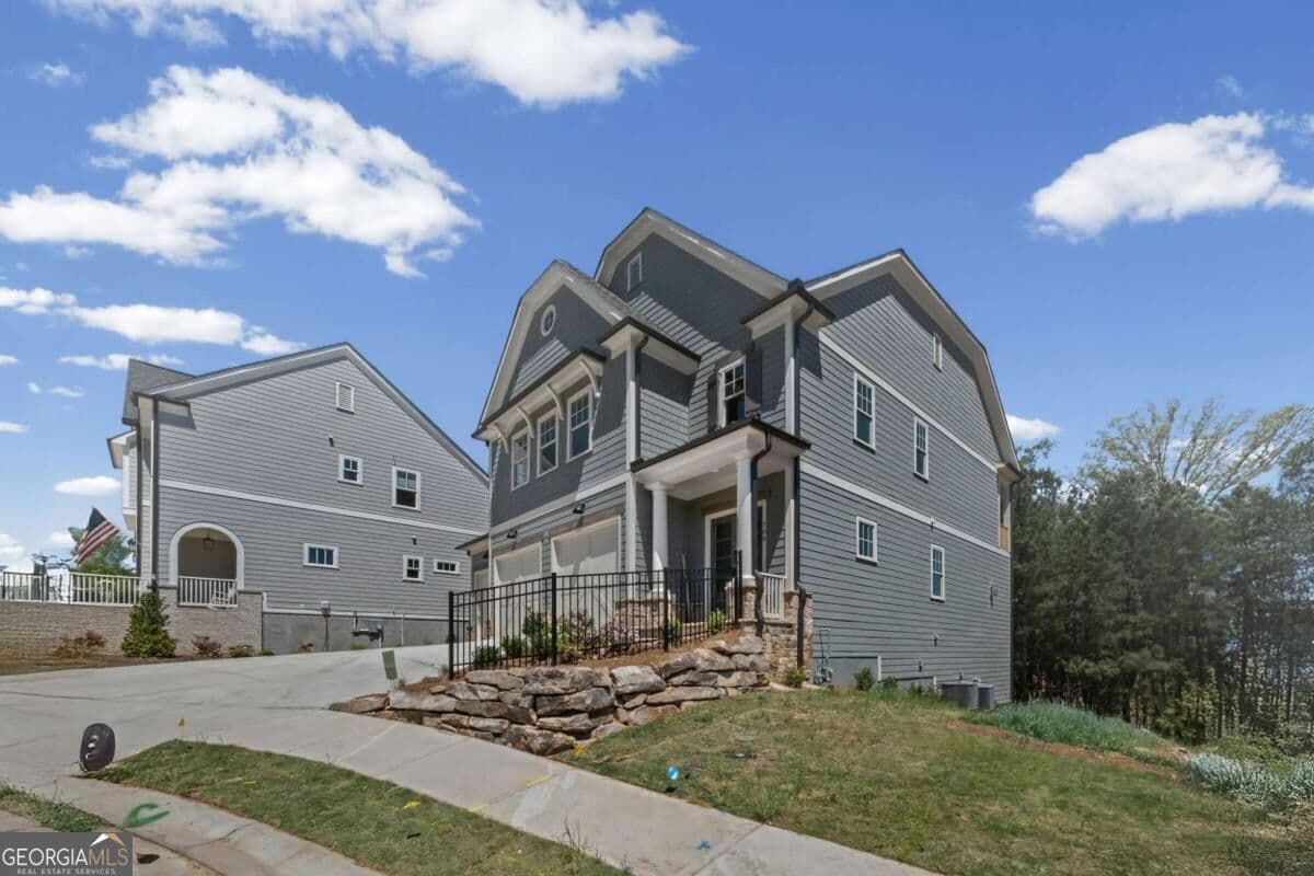 5 bedroom, 4.5 bathroom single family residence for sale at 708 Woodlake Court, Canton, GA 30114 — photo 2