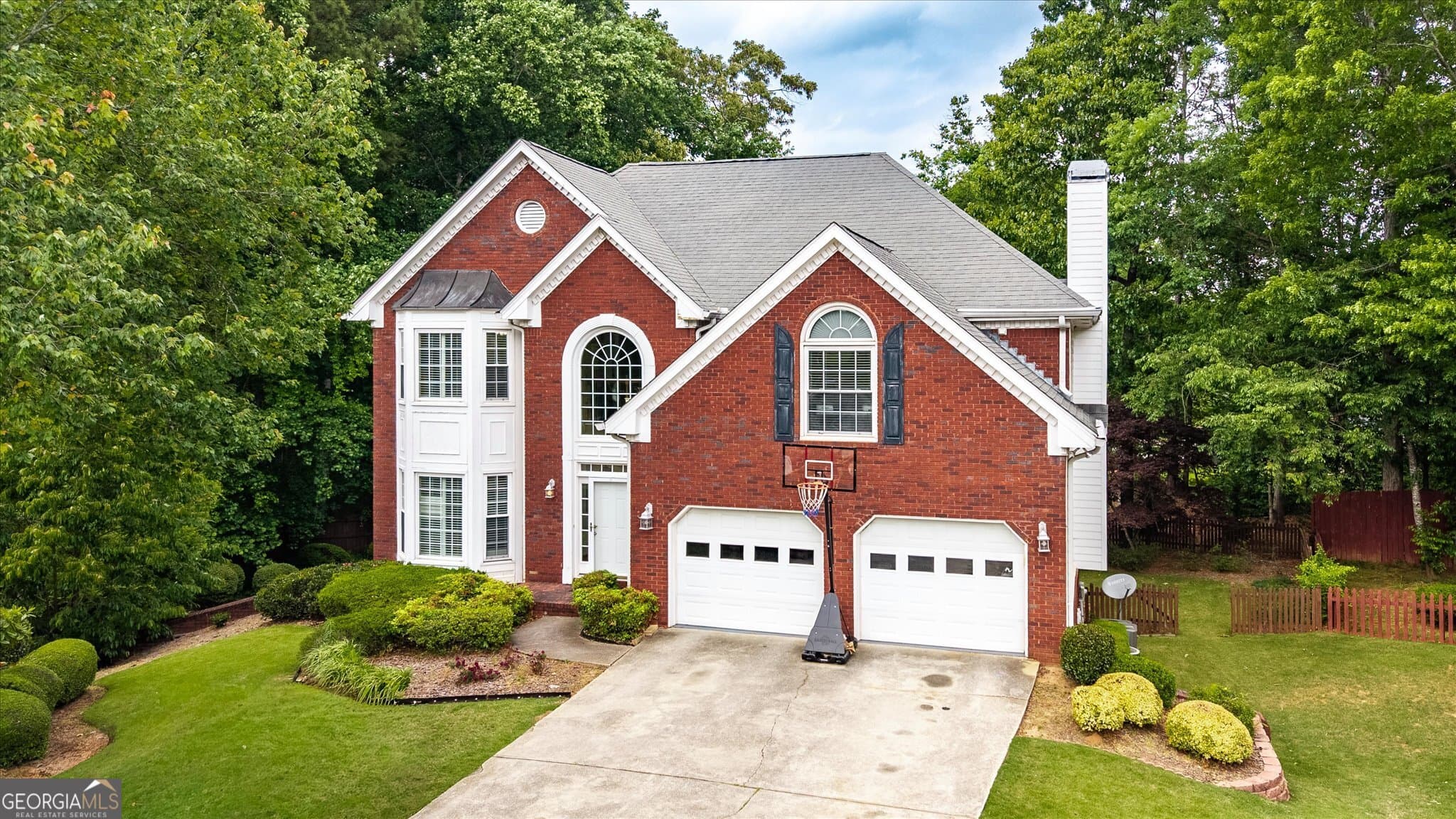 6 bedroom, 3.5 bathroom single family residence for sale at 1918 De Winton Place, Lawrenceville, GA 30043 — photo 2