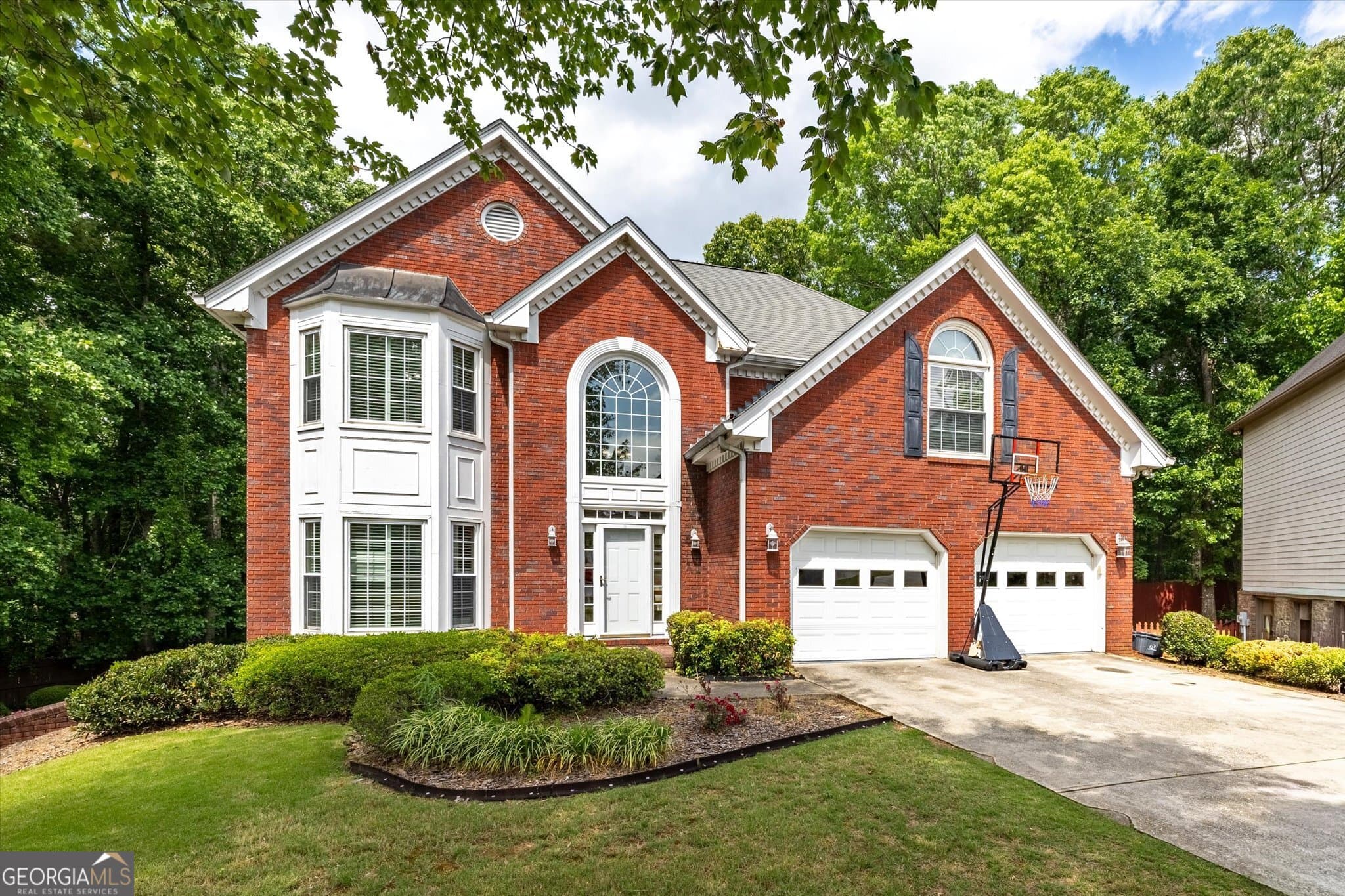 6 bedroom, 3.5 bathroom single family residence for sale at 1918 De Winton Place, Lawrenceville, GA 30043 — photo 1 of 49