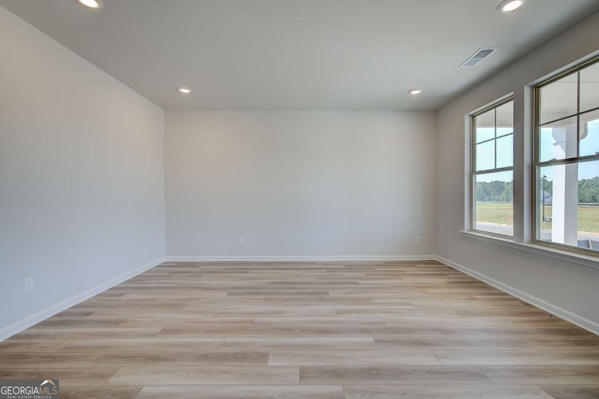 5 bedroom, 4 bathroom, 4,010 sq ft single family residence for sale at 745 Dunlake Way, Locust Grove, GA 30248 — photo 7